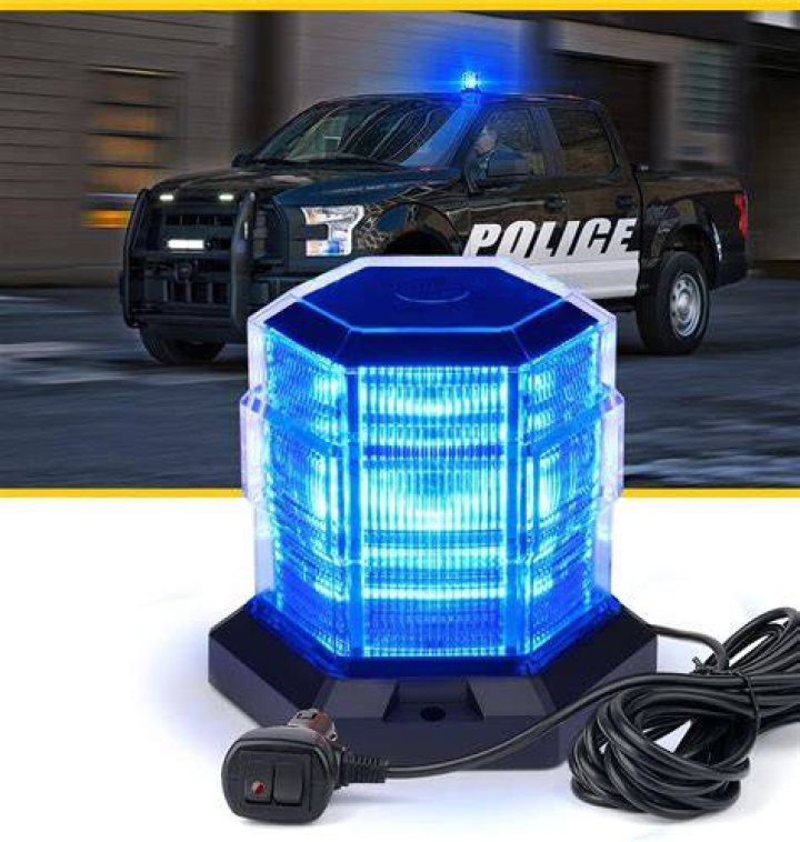 Which vehicles have flashing blue lights?